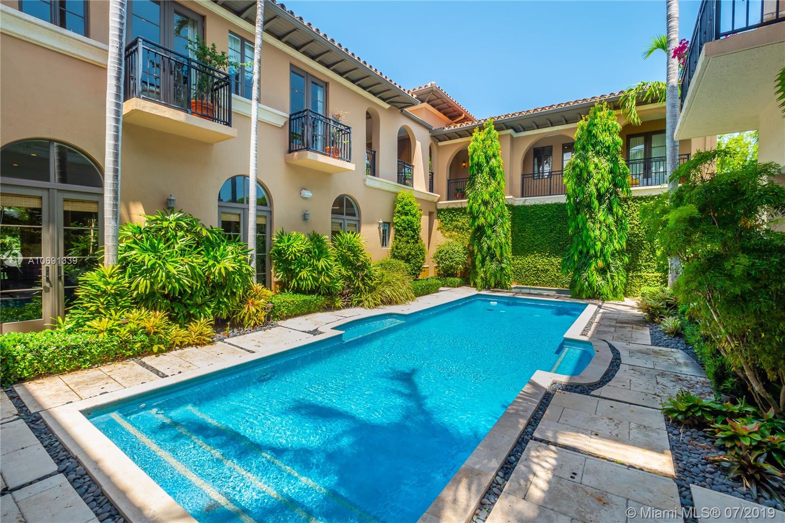 441 Island Drive Key Biscayne, FL 33149 - Photo 43 of 47 POOL LOOKING TOWARDS SEPARATE SPA