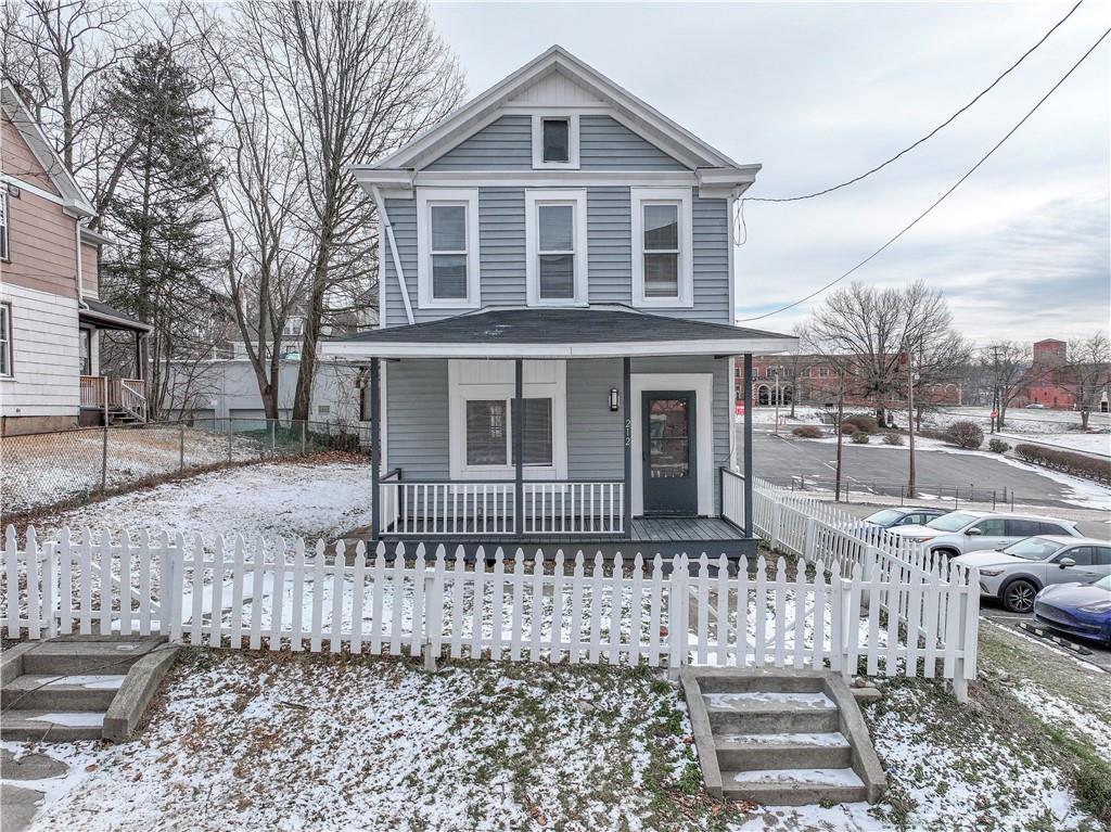 212 Ridge Avenue New Kensington, PA 15068 - Photo 1 of 32 a front view of a house with a yard