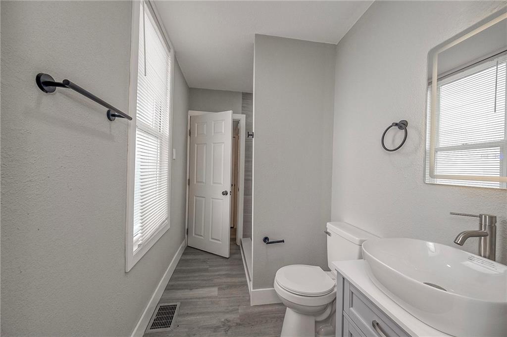 212 Ridge Avenue New Kensington, PA 15068 - Photo 13 of 32 a bathroom with a sink toilet and shower