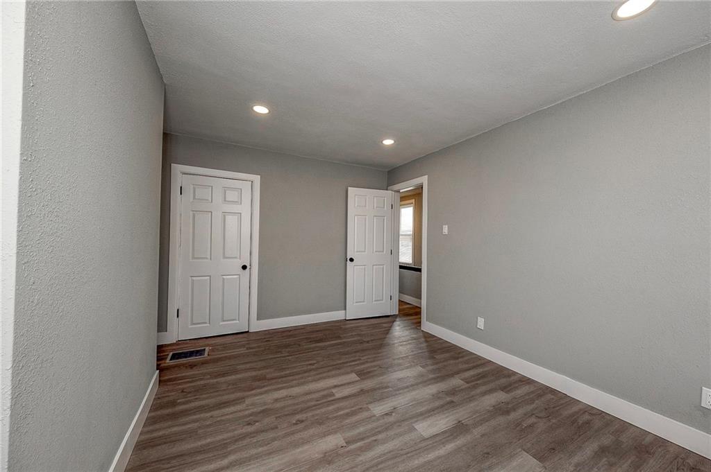 212 Ridge Avenue New Kensington, PA 15068 - Photo 24 of 32 a view of an empty room and wooden floor