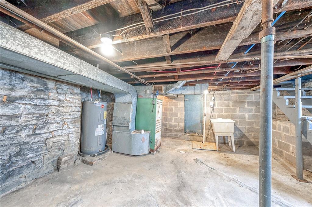 212 Ridge Avenue New Kensington, PA 15068 - Photo 25 of 32 a view of a porch with a table and chairs