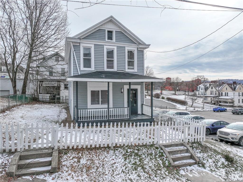212 Ridge Avenue New Kensington, PA 15068 - Photo 31 of 32 a front view of a house with parking