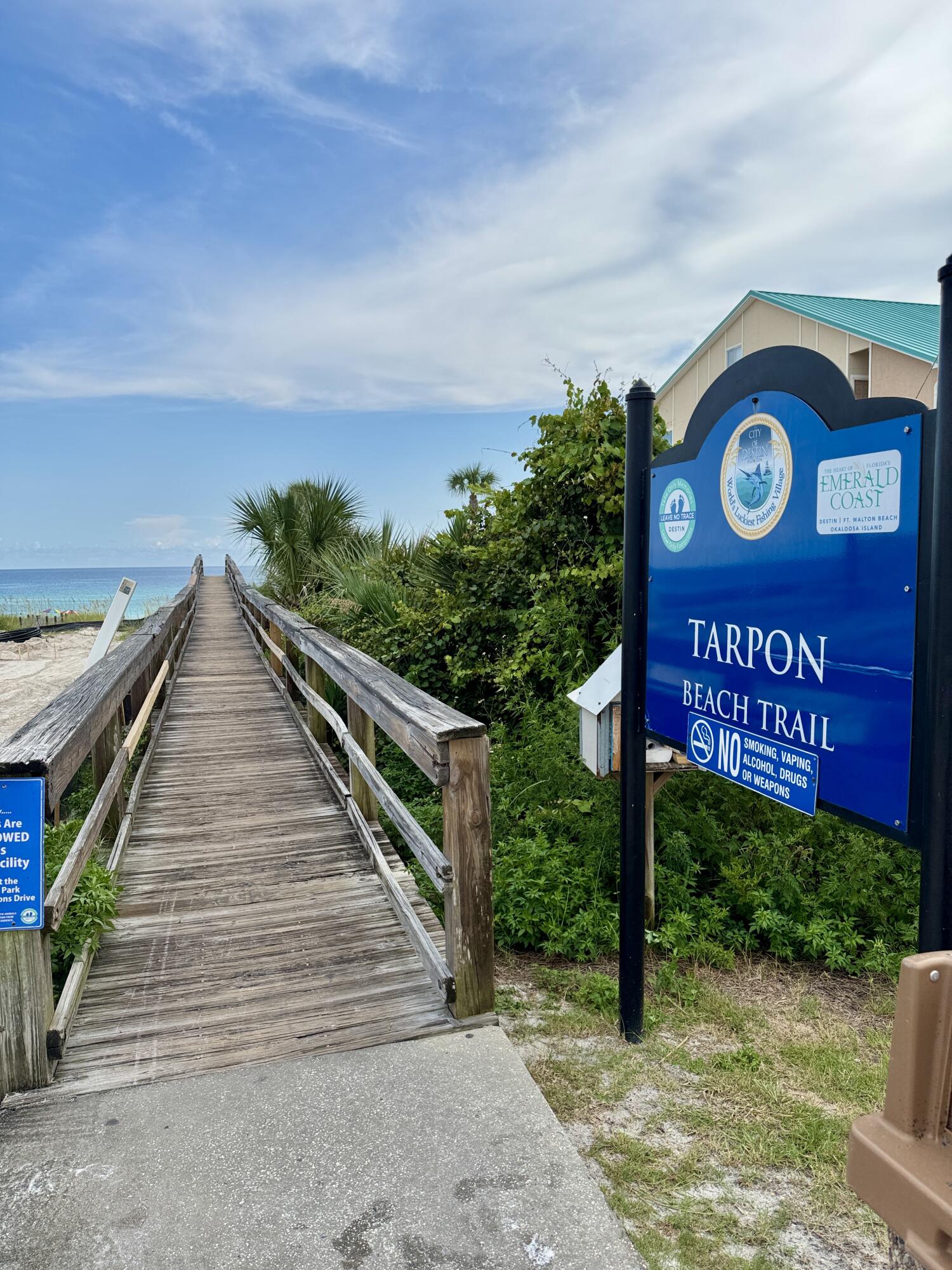 87 Dolphin Street Destin, FL 32541 - Photo 23 of 32 a view of a street with benches