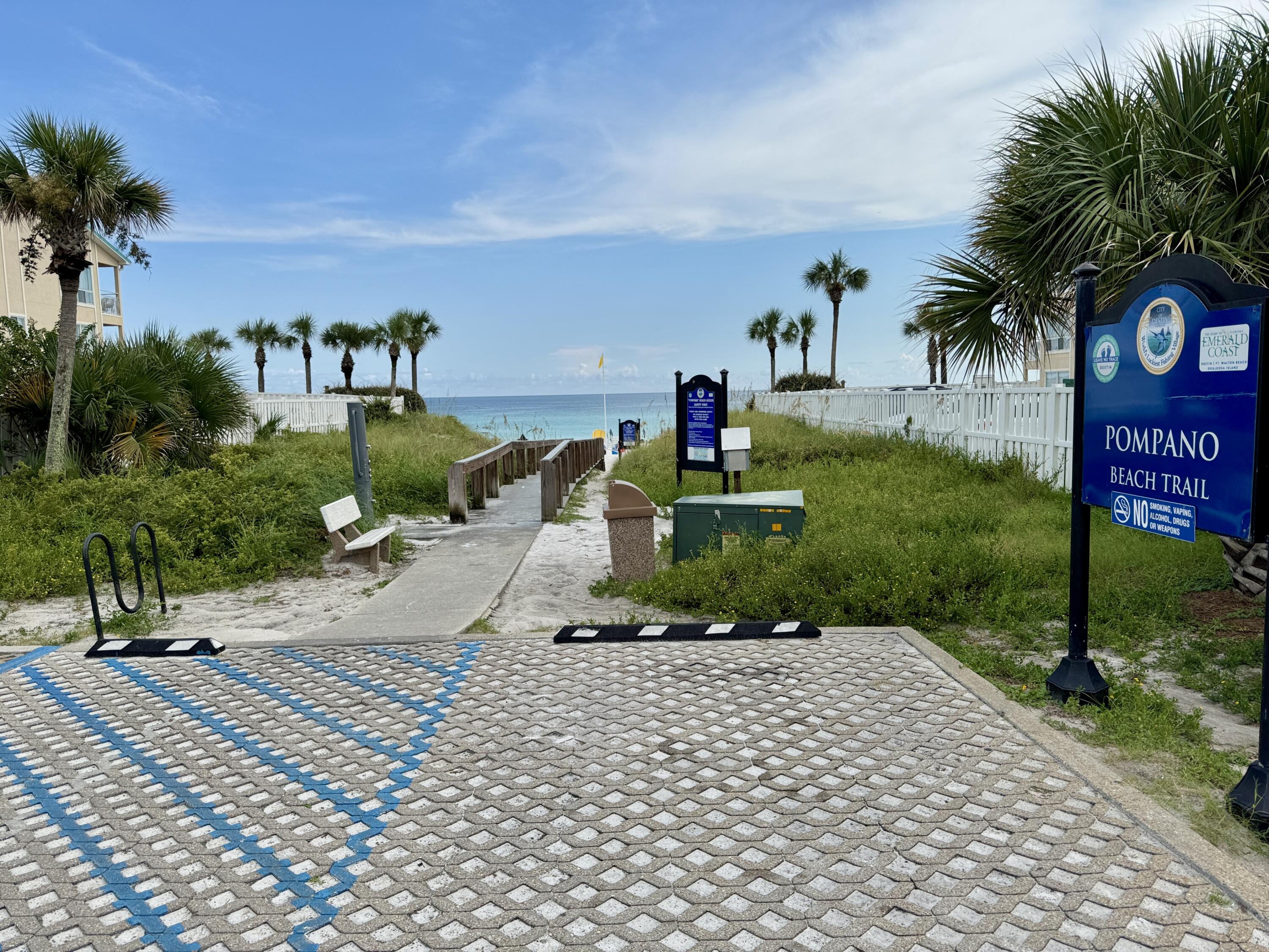 87 Dolphin Street Destin, FL 32541 - Photo 27 of 32 a front view of a house with garden