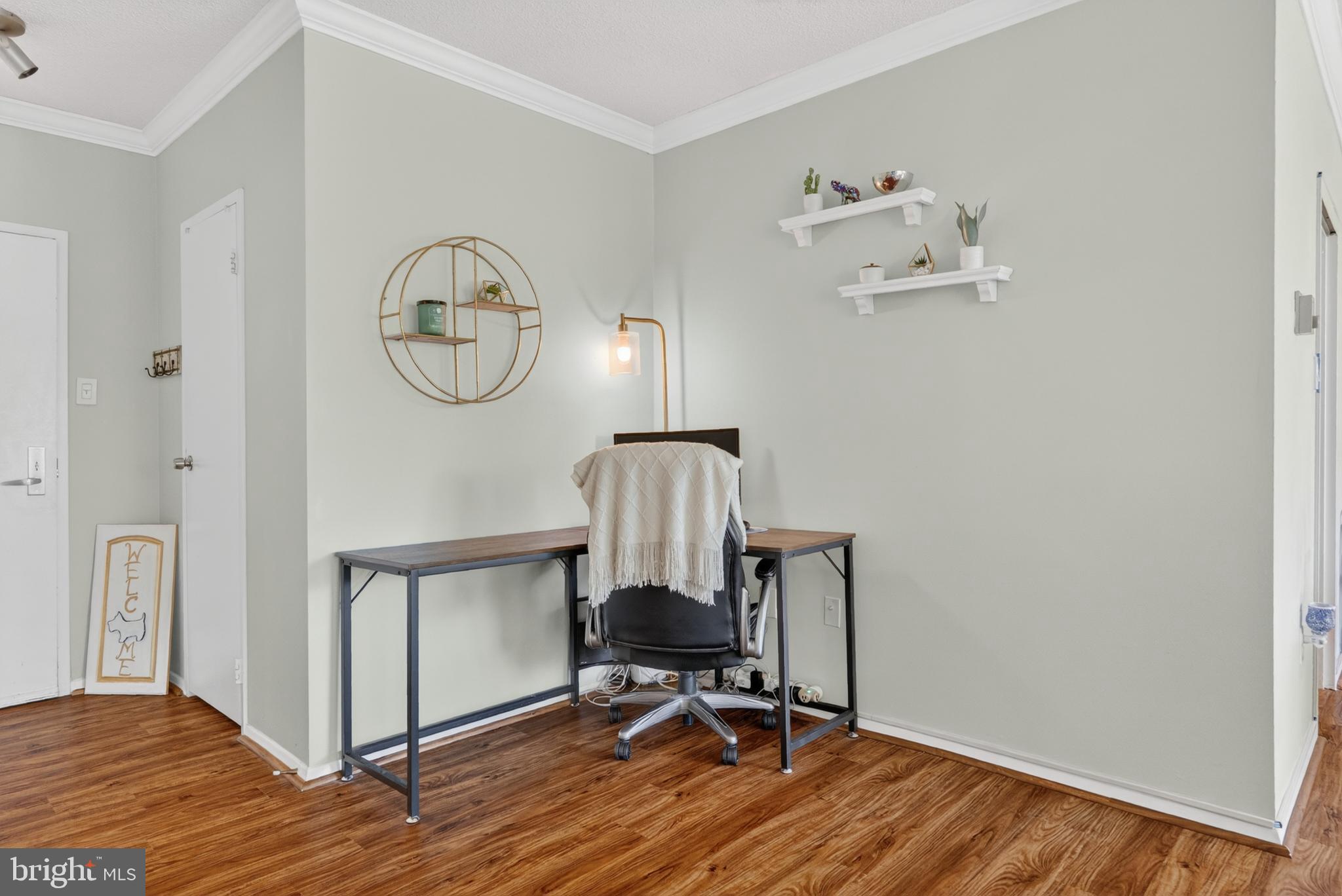 4141 North Henderson Road, Unit 302 Arlington, VA 22203 - Photo 19 of 40 a view of workspace with wooden floor
