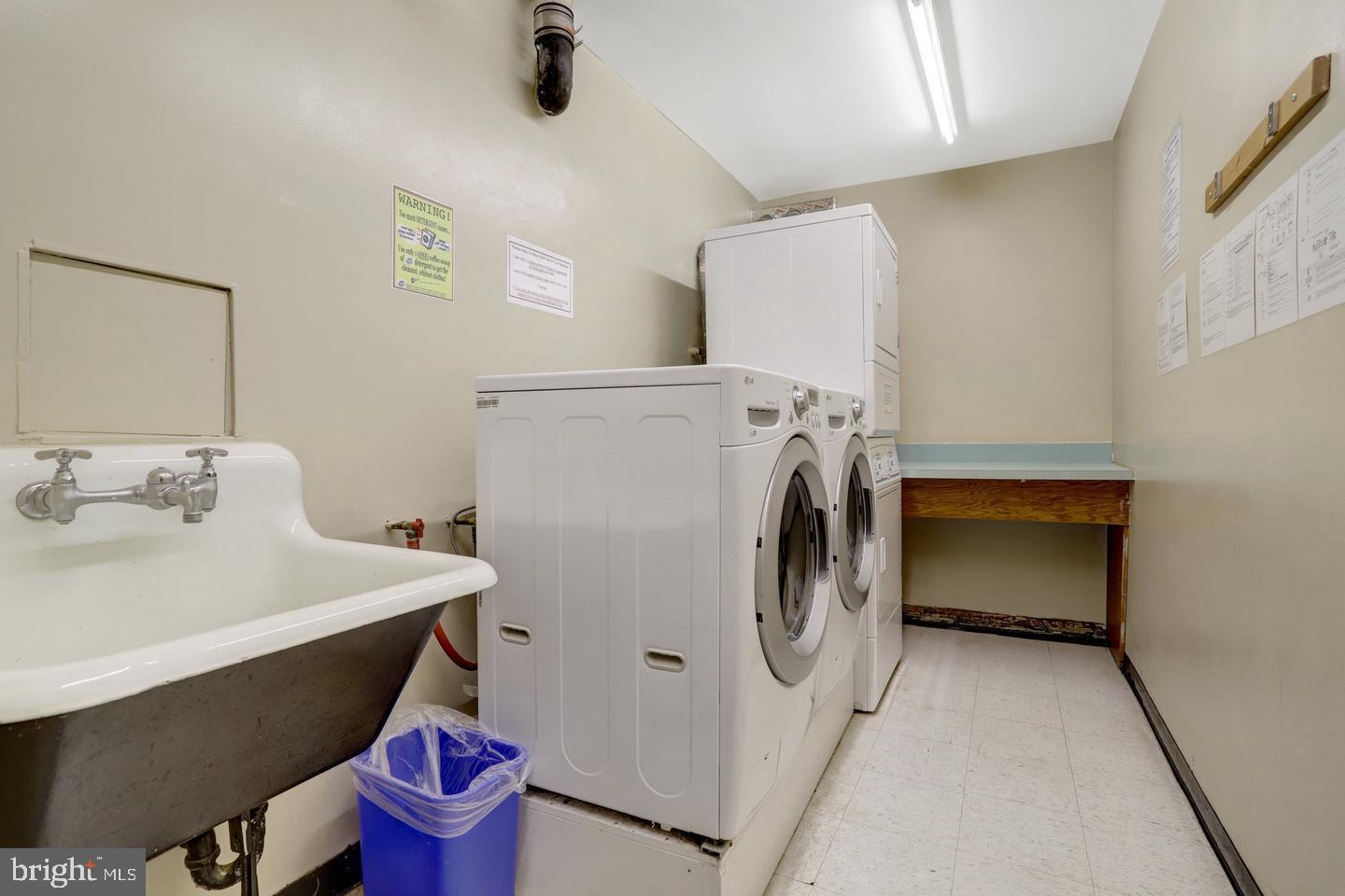 4141 North Henderson Road, Unit 302 Arlington, VA 22203 - Photo 25 of 40 a utility room with dryer and washer