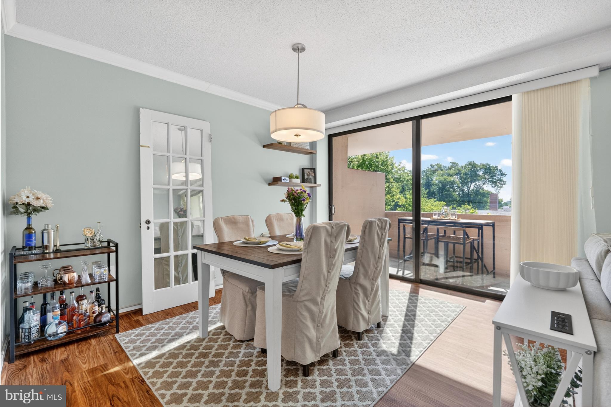 4141 North Henderson Road, Unit 302 Arlington, VA 22203 - Photo 6 of 40 a view of a dining room with furniture window and outside view