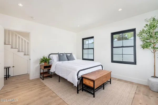 a bathroom with a sink a toilet and vanity