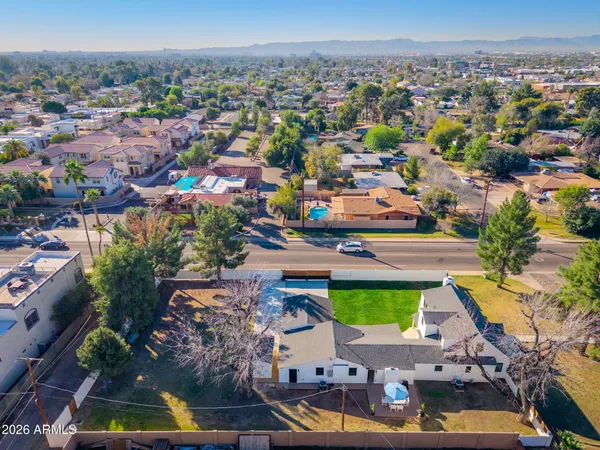 a view of a yard and a street view