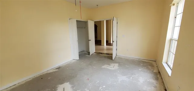 a view of empty room with a window