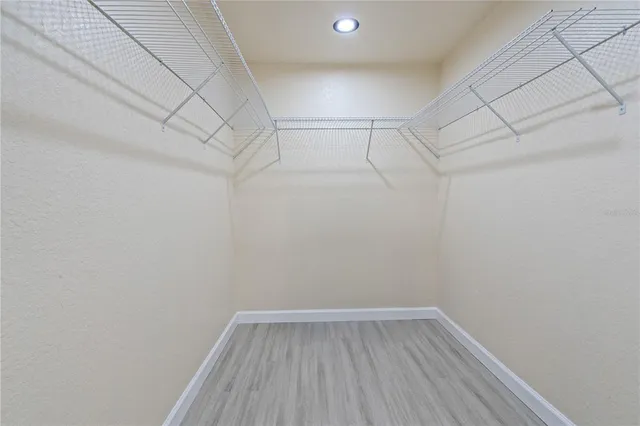 a view of a room with racks on the wall