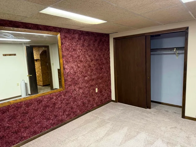 a view of a hallway with closet