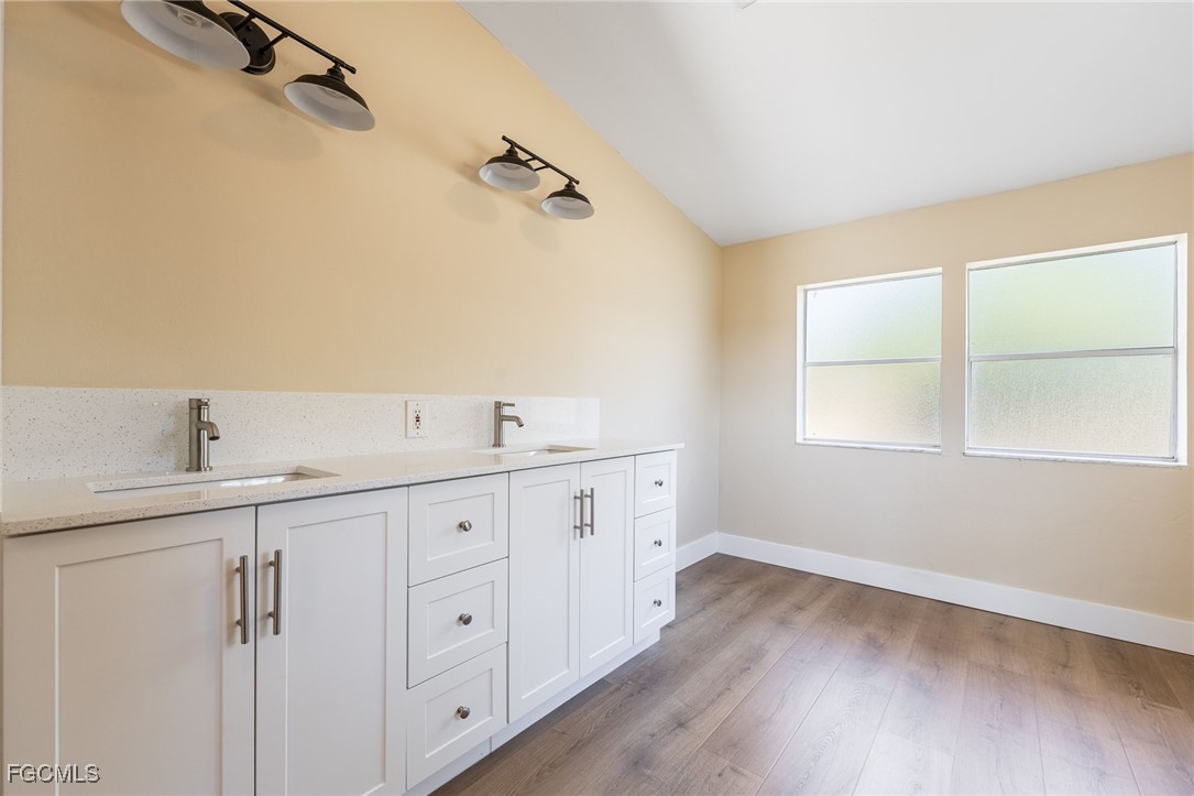 250 Trader Road LaBelle, FL 33935 - Photo 25 of 42 a view of a room with window and wooden floor