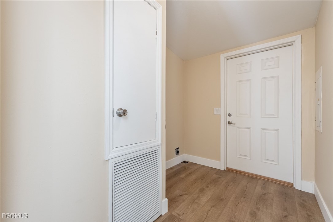 250 Trader Road LaBelle, FL 33935 - Photo 32 of 42 a view of a livingroom with wooden floor