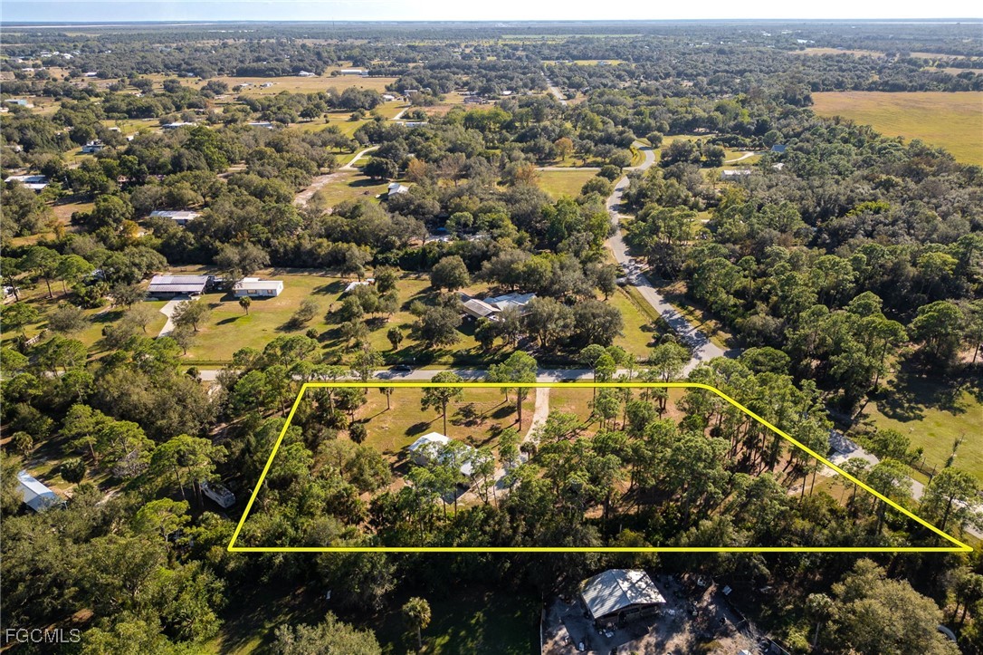 250 Trader Road LaBelle, FL 33935 - Photo 42 of 42 an aerial view of a residential houses covered with trees