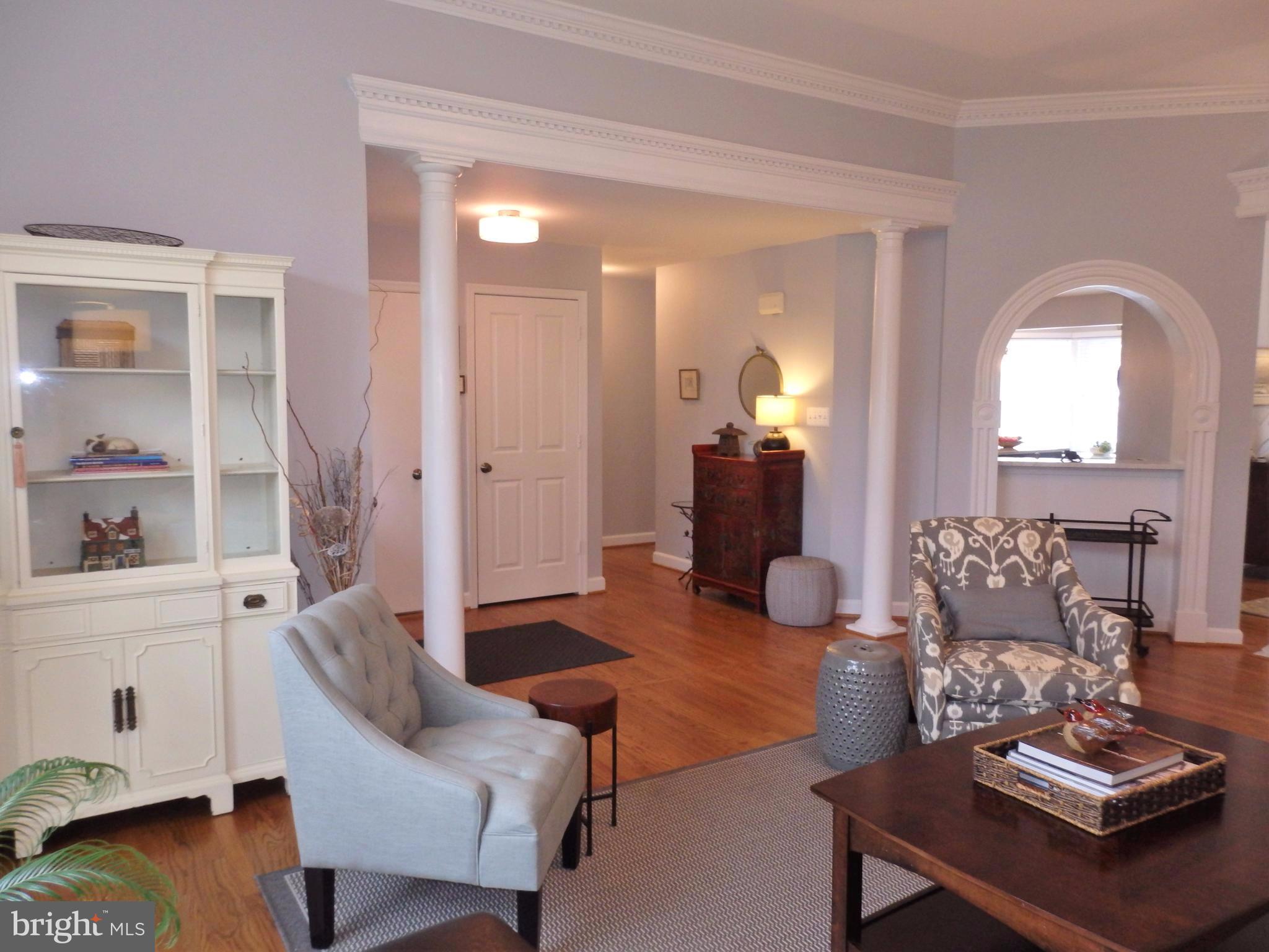 2454 Bear Den Road Frederick, MD 21701 - Photo 2 of 30 a living room with furniture and wooden floor