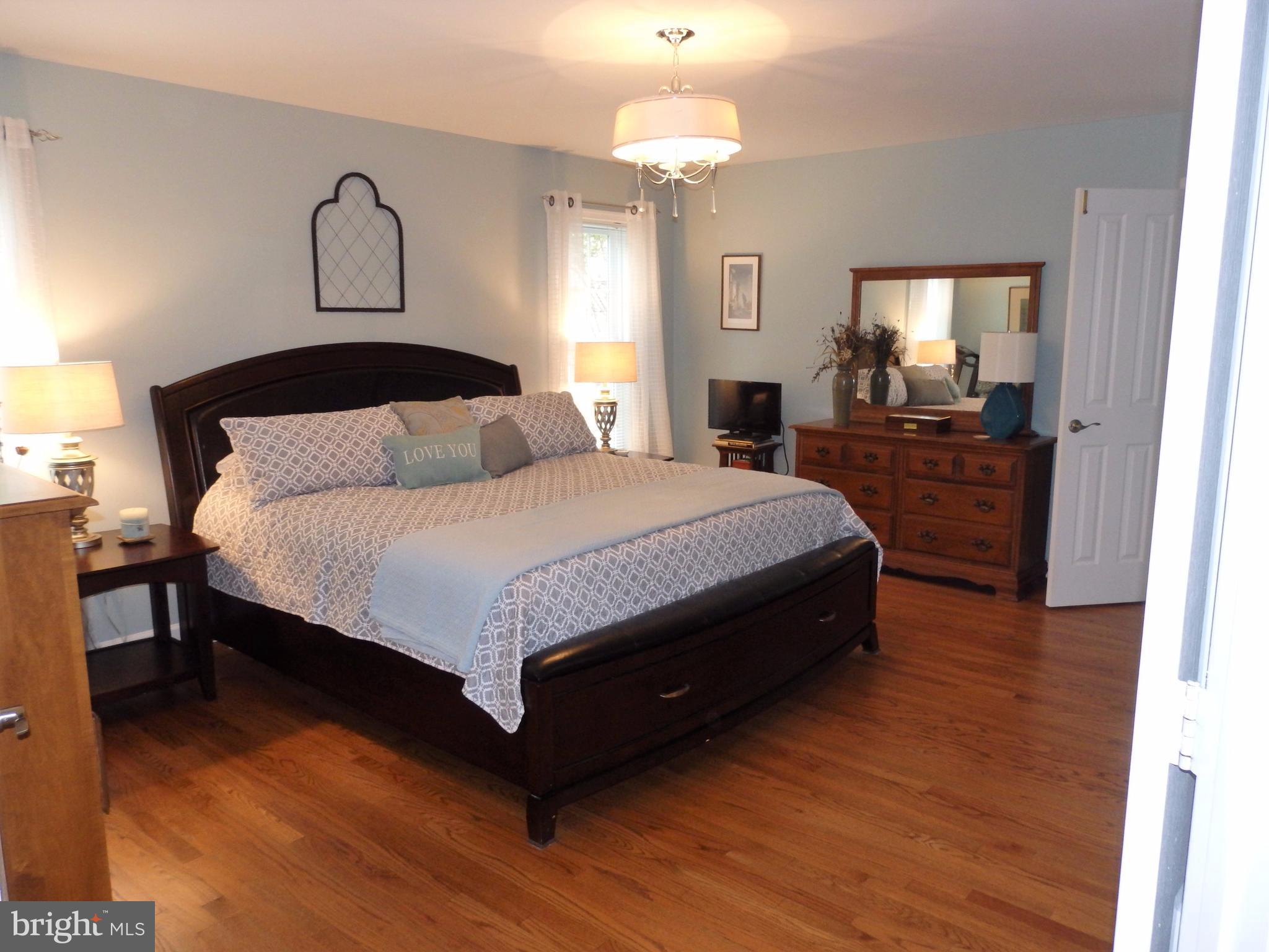 2454 Bear Den Road Frederick, MD 21701 - Photo 13 of 30 a bedroom with a bed and window