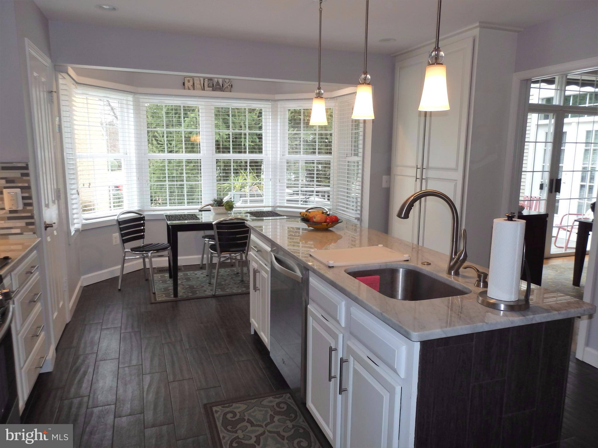 2454 Bear Den Road Frederick, MD 21701 - Photo 10 of 30 a kitchen with sink and view of living room