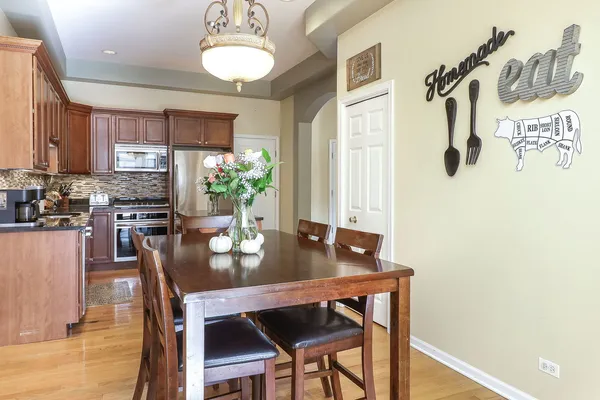 a view of a dining room with furniture