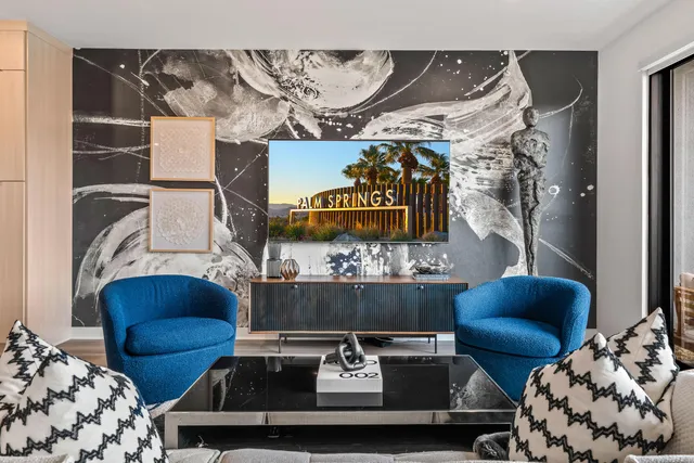 a living room with a couch and a table