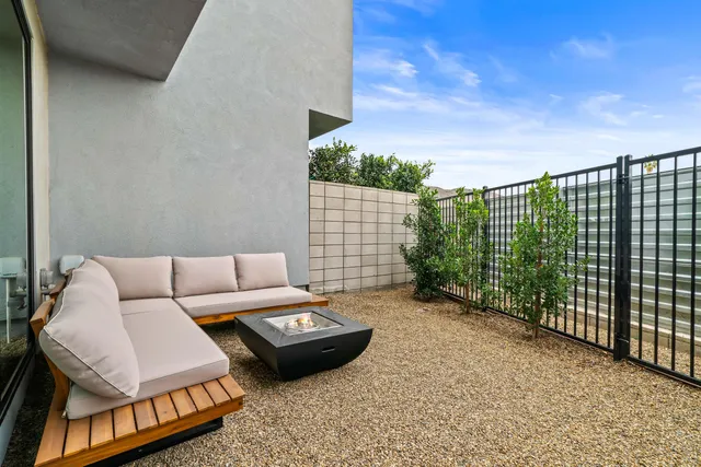 a living room with furniture and a couch