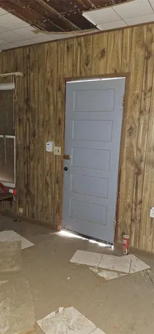 a view of a room with window and tub