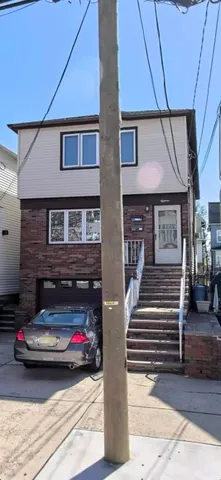 a car parked in front of a house
