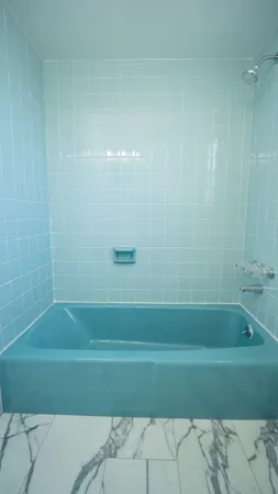 a bathroom with a bathtub