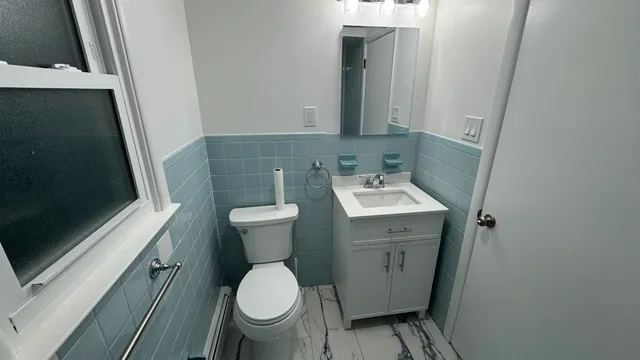 a bathroom with a sink and a toilet