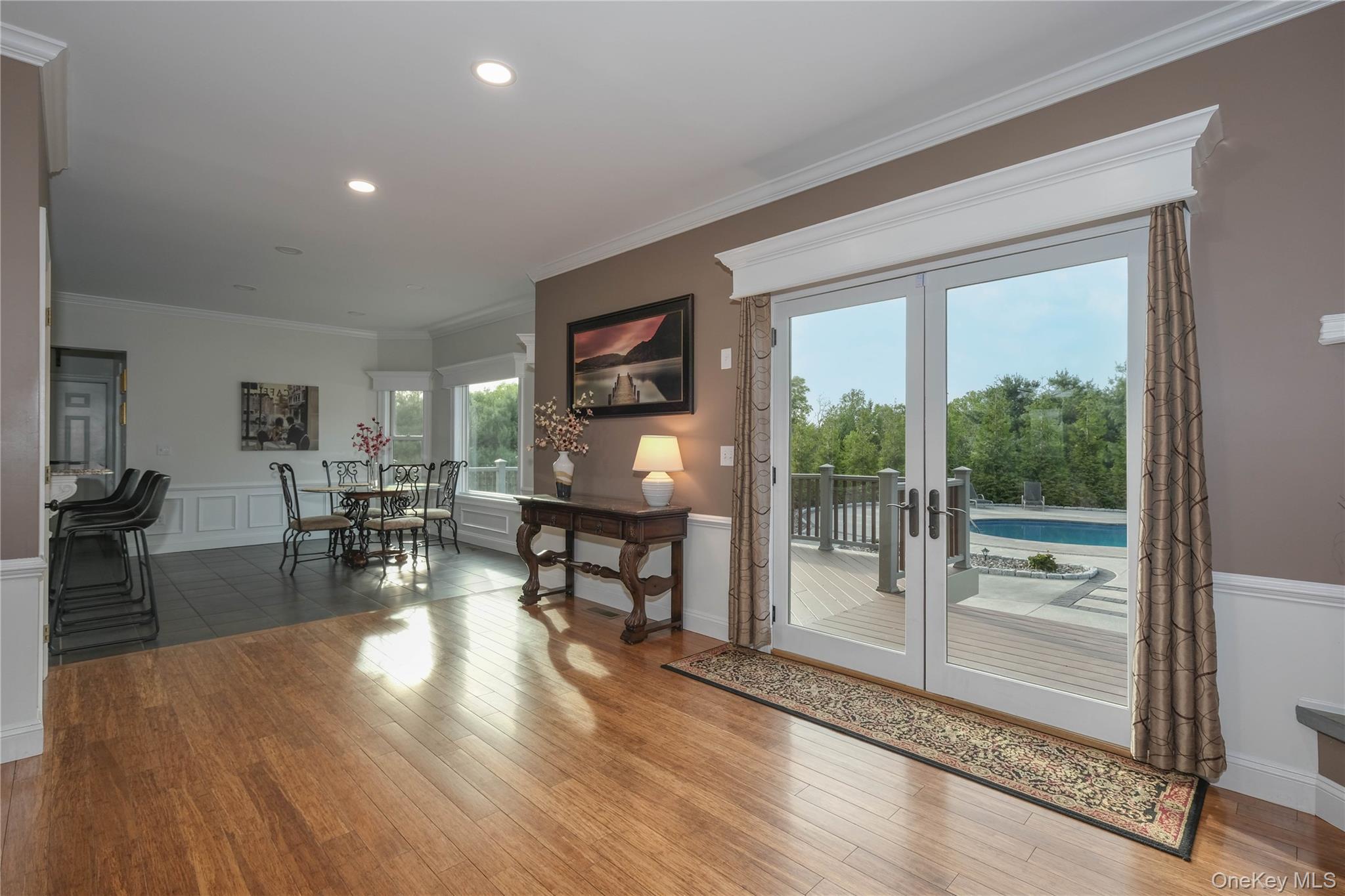 163 Hapeman Hill Road Red Hook, NY 12571 - Photo 11 of 50 Living room flows seamlessly to an informal dining area and open kitchen - all overlooking the manicured grounds.