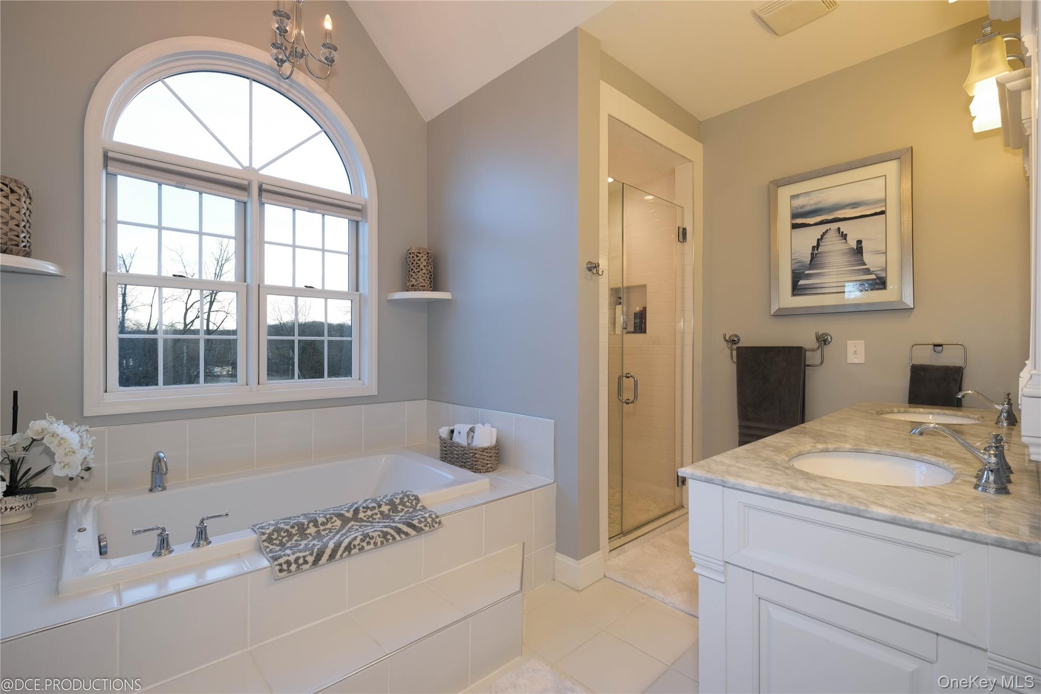 163 Hapeman Hill Road Red Hook, NY 12571 - Photo 22 of 50 Primary Bath with garden tub, separate shower, double vanity, tile flooring and palladian window.