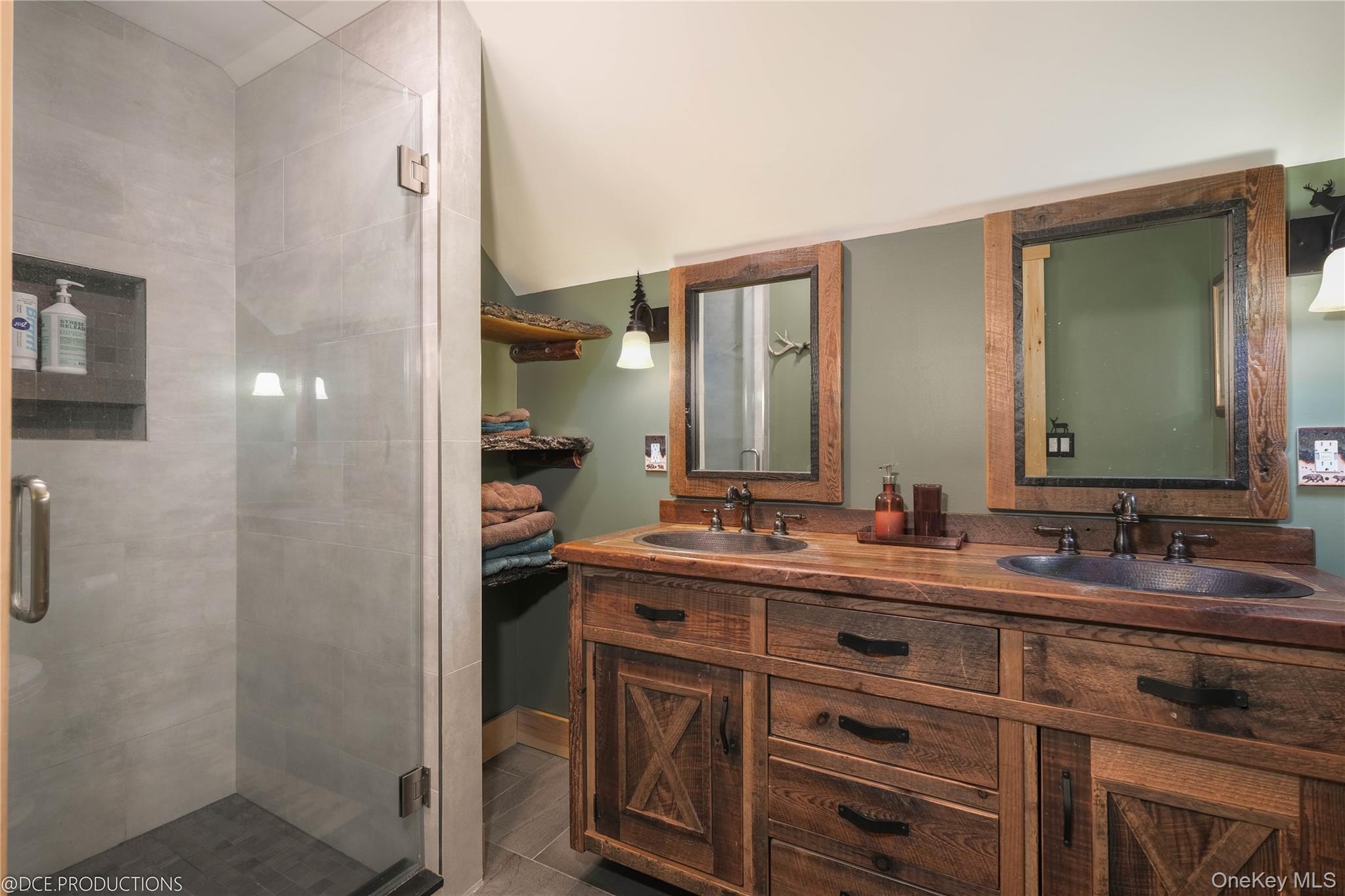 163 Hapeman Hill Road Red Hook, NY 12571 - Photo 25 of 50 Bathroom with a tile and glass shower and double vanity