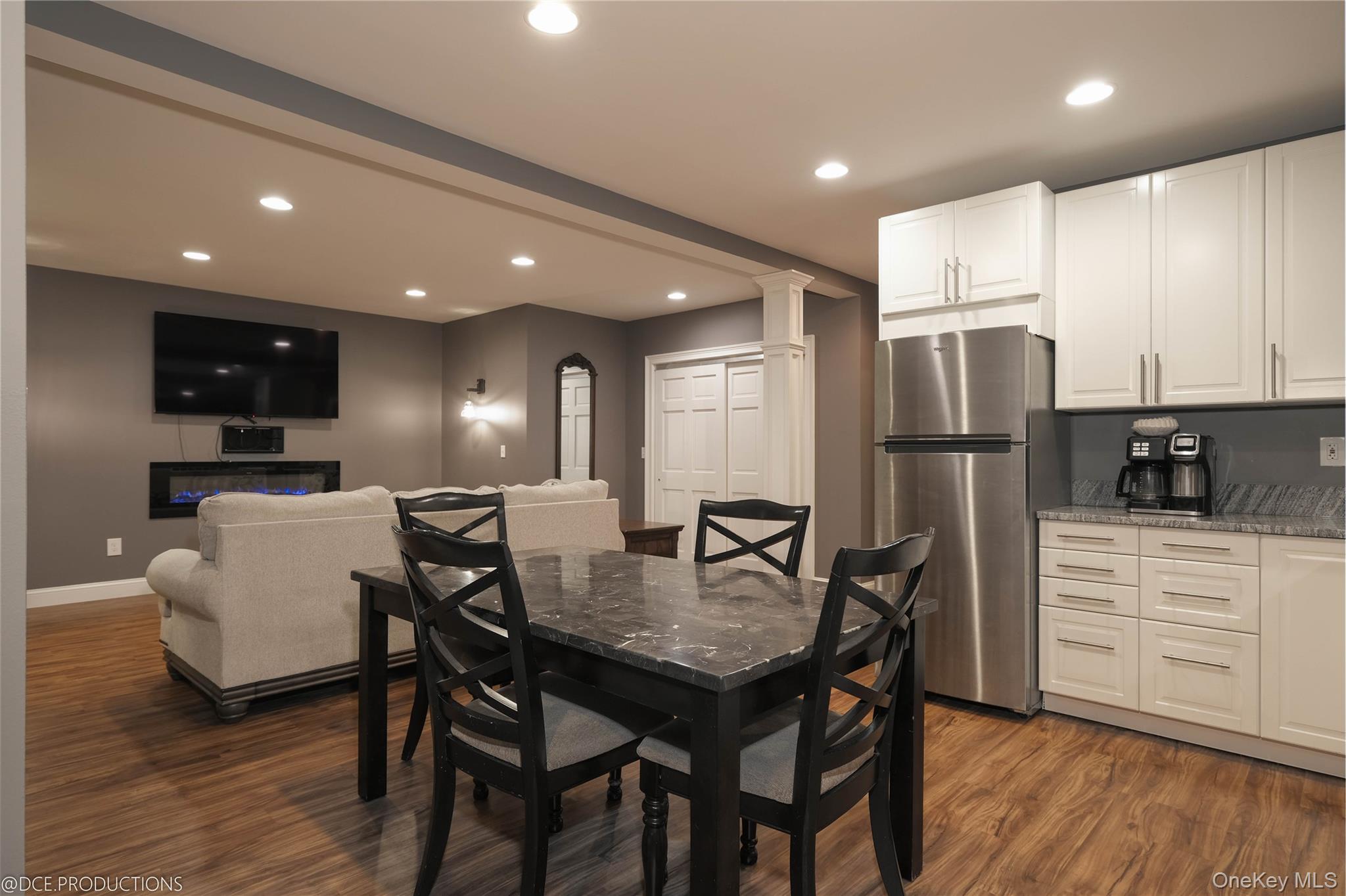 163 Hapeman Hill Road Red Hook, NY 12571 - Photo 32 of 50 Dining space featuring wood-style flooring, recessed lighting, and is open to a lounge area.