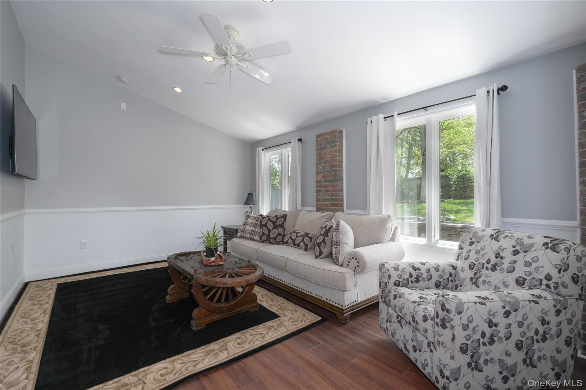 163 Hapeman Hill Road Red Hook, NY 12571 - Photo 43 of 50 Living room flooded with natural light, gleaming floors, ceiling fan, recessed lighting and outside access to flexible covered patio or carport.