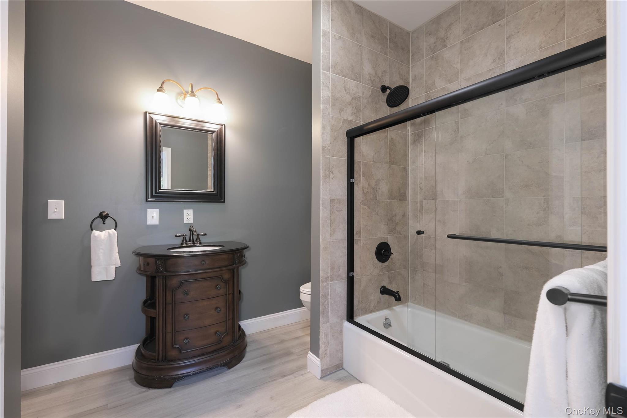 163 Hapeman Hill Road Red Hook, NY 12571 - Photo 47 of 50 Beautiful bath with tile and glass shower/tub combo, tile flooring and chic finishes