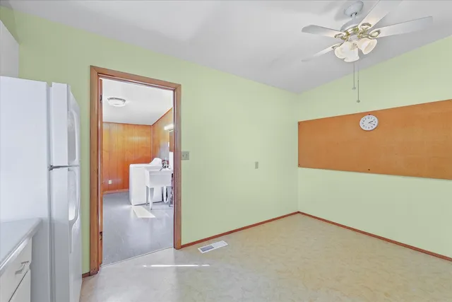 a kitchen with a sink cabinets and window