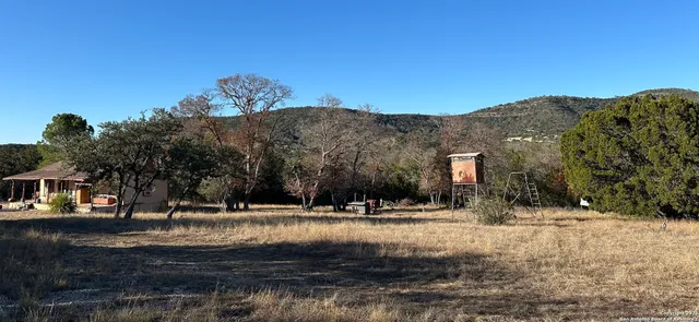 a view of outdoor space with trees around
