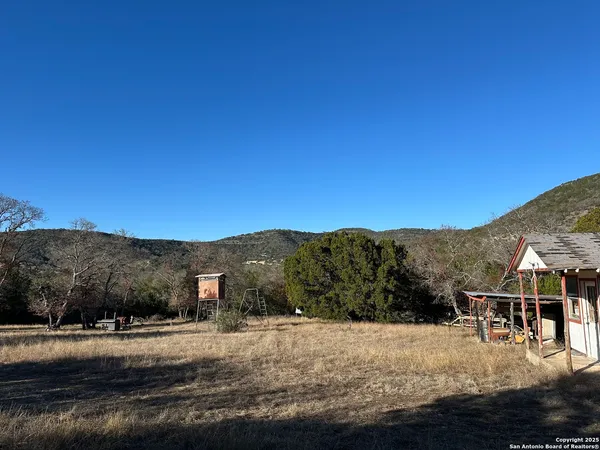 a view of house with mountain view