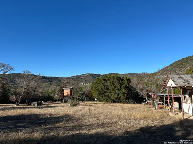 a view of house with mountain view