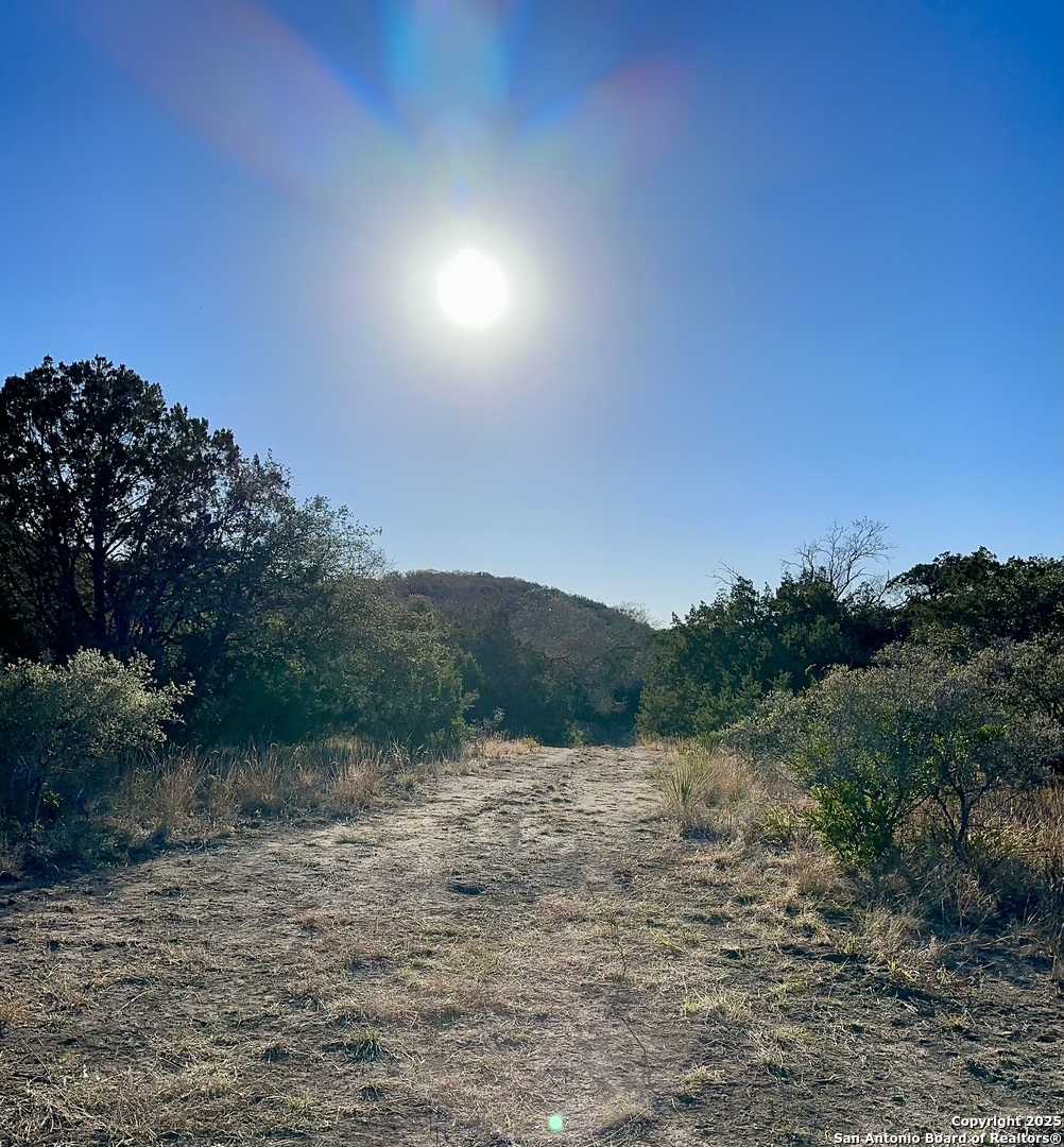 Lot 96 Black Jack Hollow Utopia, TX 78884 - Photo 18 of 20 a view of a lake and mountain view