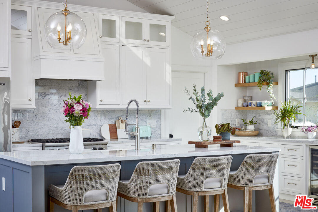 8388 Chase Avenue Los Angeles, CA 90045 - Photo 18 of 30 a kitchen with a table and chairs in it