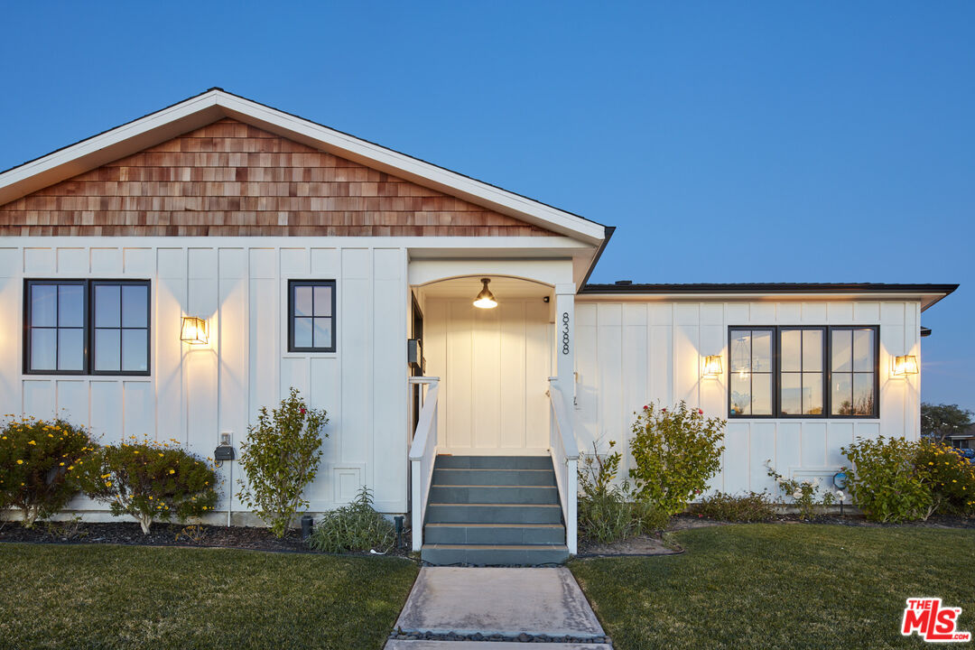 8388 Chase Avenue Los Angeles, CA 90045 - Photo 2 of 30 a front view of a house with a yard