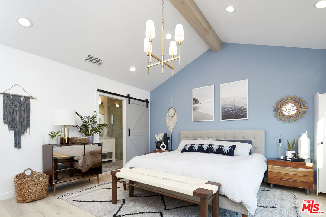 8388 Chase Avenue Los Angeles, CA 90045 - Photo 21 of 30 a bedroom with a bed a couch and dresser