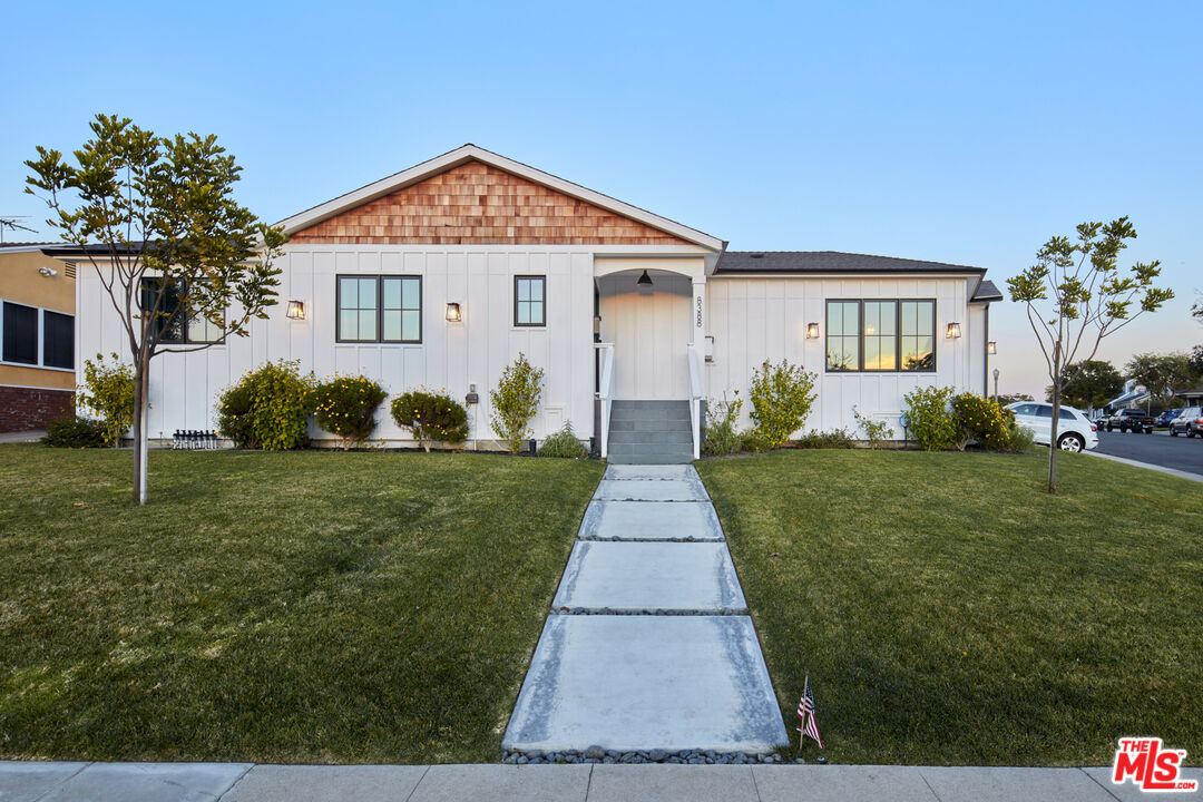 8388 Chase Avenue Los Angeles, CA 90045 - Photo 27 of 30 a front view of a house with a yard