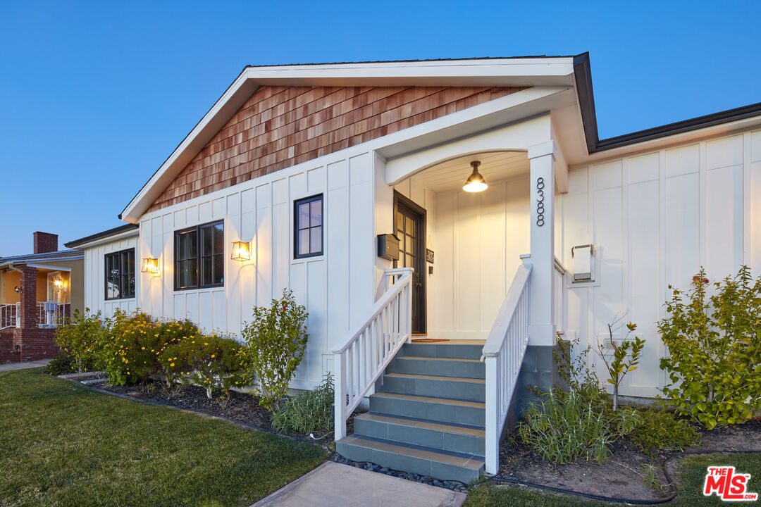 8388 Chase Avenue Los Angeles, CA 90045 - Photo 30 of 30 a front view of a house with garden