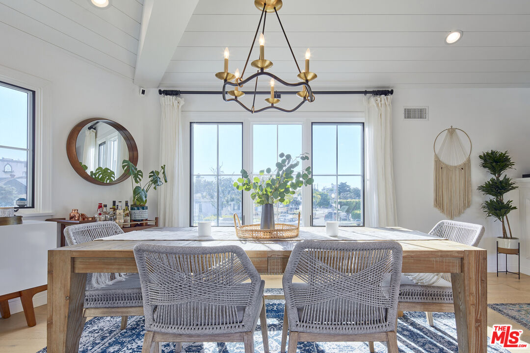 8388 Chase Avenue Los Angeles, CA 90045 - Photo 4 of 30 a view of a dining room with furniture