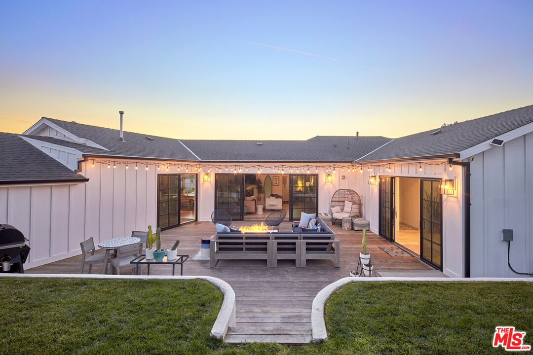 8388 Chase Avenue Los Angeles, CA 90045 - Photo 7 of 30 a view of a house with backyard porch and patio