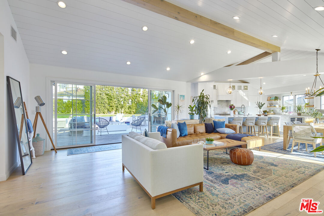 8388 Chase Avenue Los Angeles, CA 90045 - Photo 10 of 30 a living room with lots of furniture and a large window