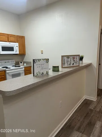 a utility room with washer and dryer