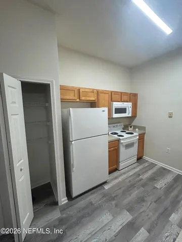 a bathroom with a bathtub and a toilet